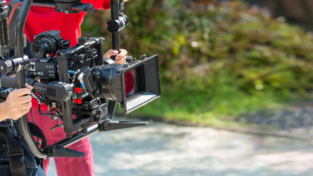 A video camera on set of a commercial production