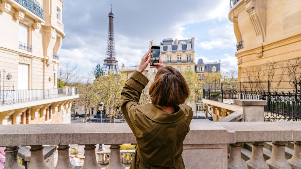Woman collects user-generated content in Paris